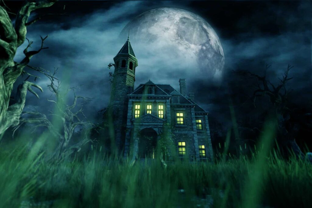 A spooky haunted house in Houston illuminated by a full moon.
