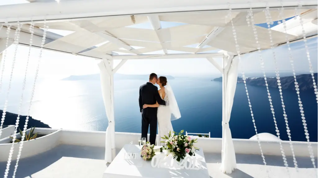 Newlywed husband and wife hugging